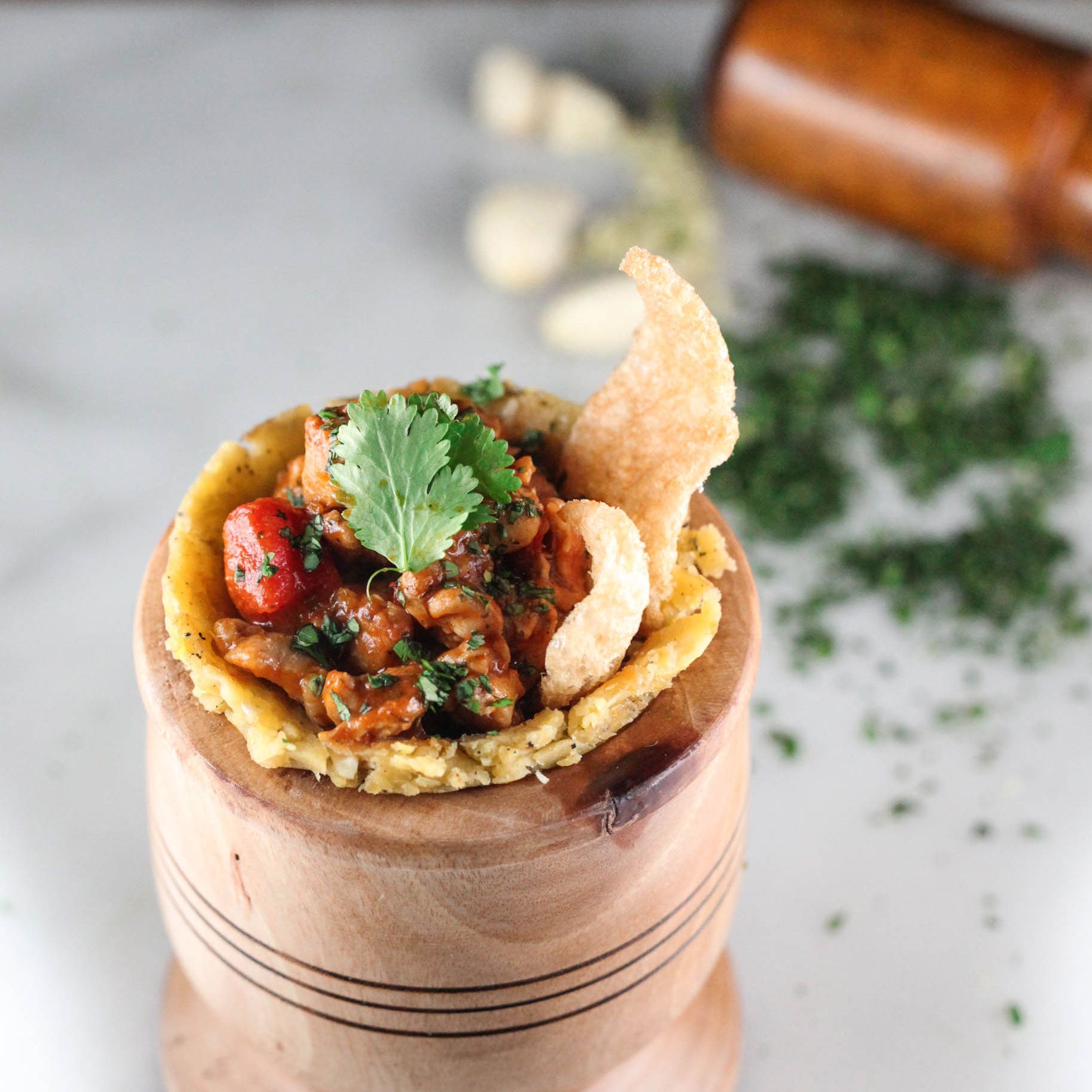 Grilled Mofongo-Stuffed Chicken Breast with Garlic Mojo Sauce