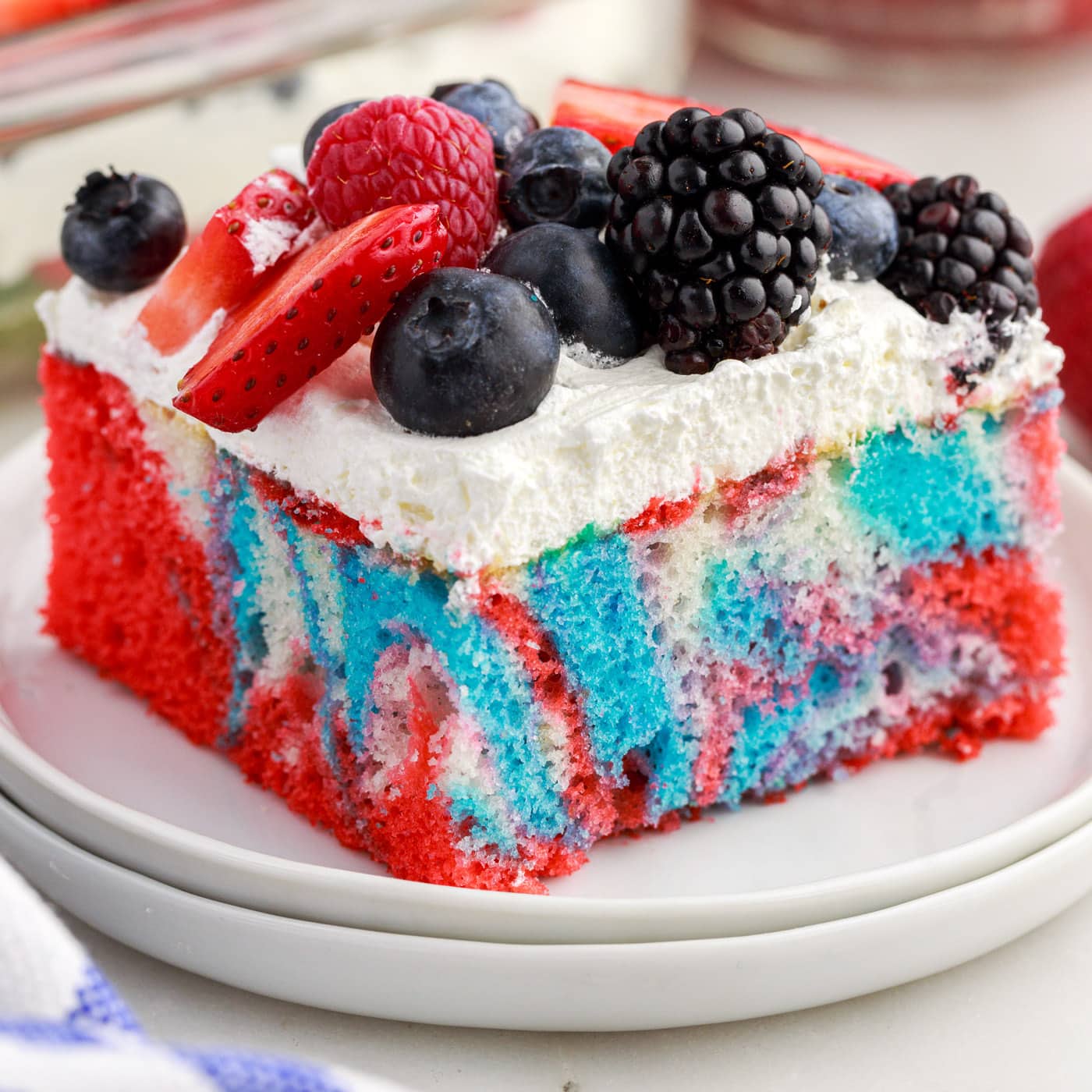 Layered Red, White, and Blue Berry Cream Cake