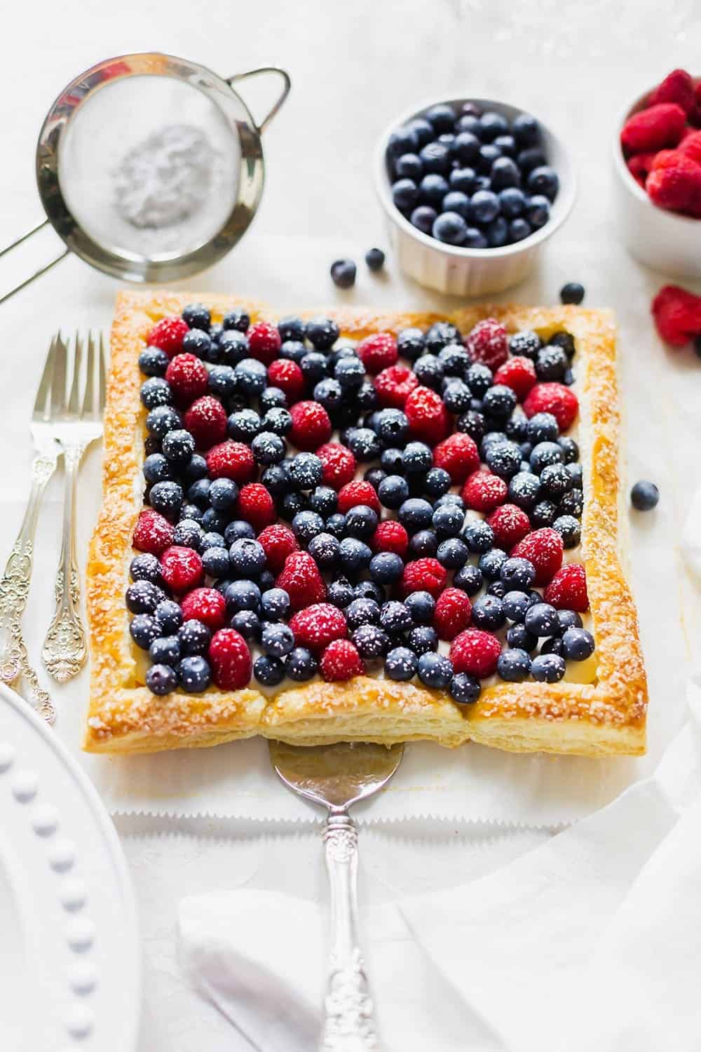 Baked Red, White, and Blue Berry Tart with Raspberry Glaze