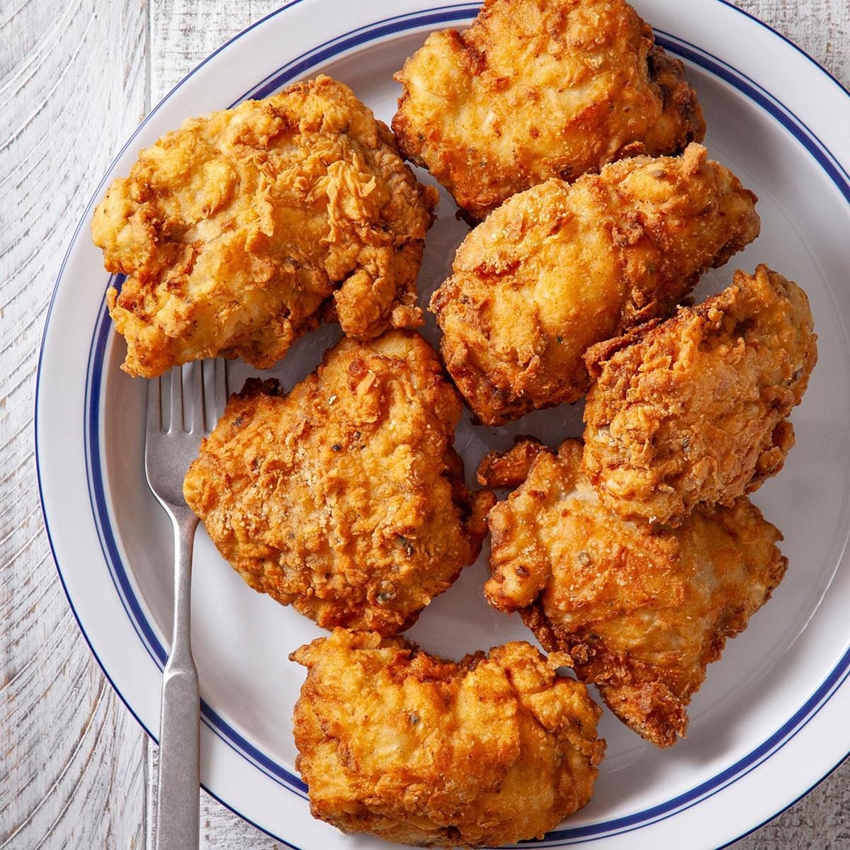 Deep-Fried Chicken Thighs and Onion Rings with Crunchy Breadcrumb Coating