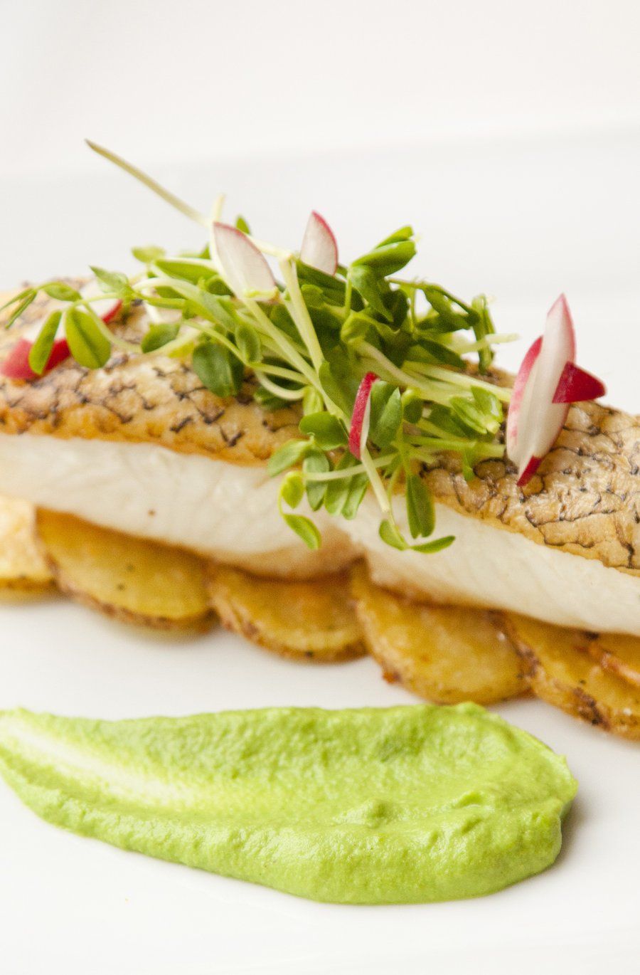 Pan-Seared Sea Bass with Pea Purée and Crispy Bacon