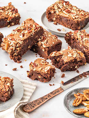Warm Bourbon Pecan Brownies with Sea Salt