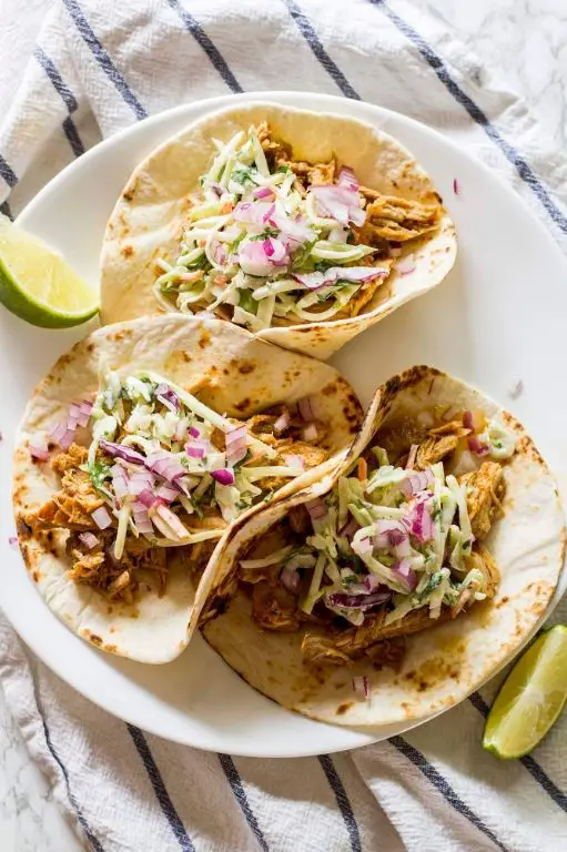 Grilled Green Chile Pork Tacos with Pickled Onions
