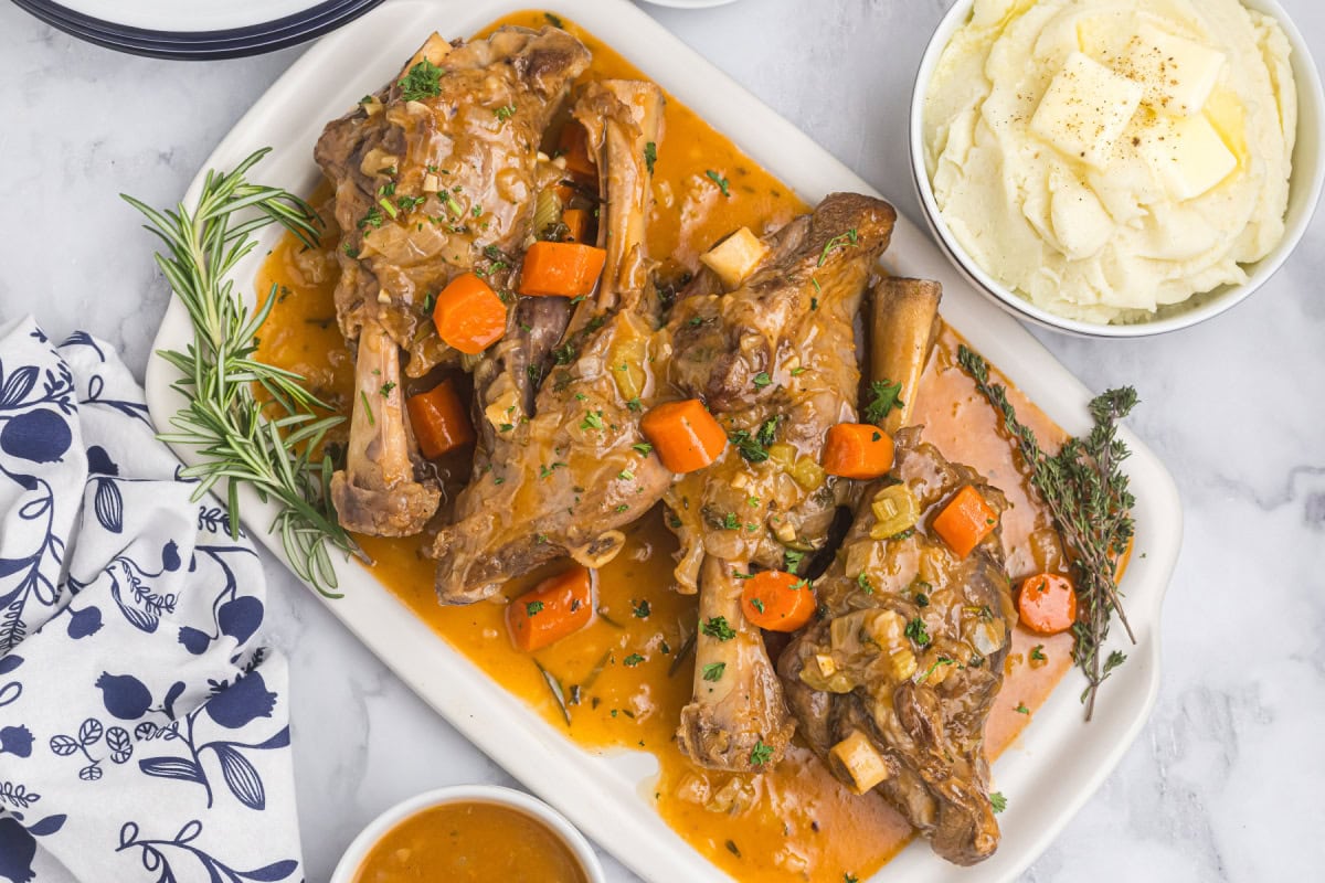 Slow-Cooked Lamb Shanks Braised in Shiraz with Rosemary