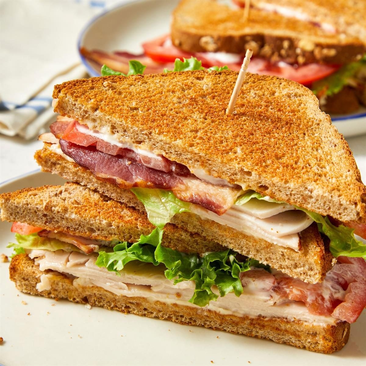 Stacked Turkey and Avocado Club Sandwich with Chipotle Mayo