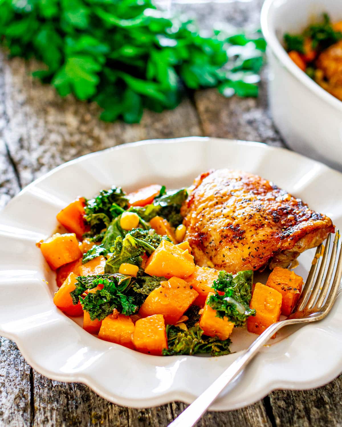 Pan-Seared Chicken Thighs with Roasted Sweet Potato and Kale