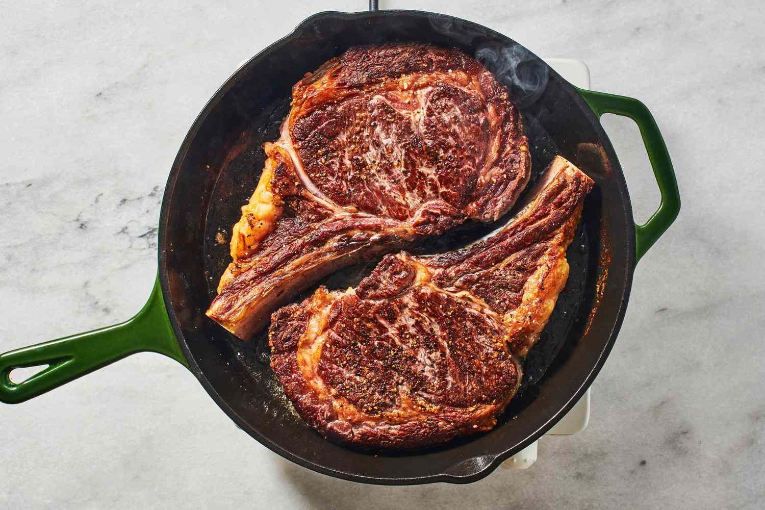 Spicy Ancho Chili Rubbed Ribeye Steaks on the Gas Grill