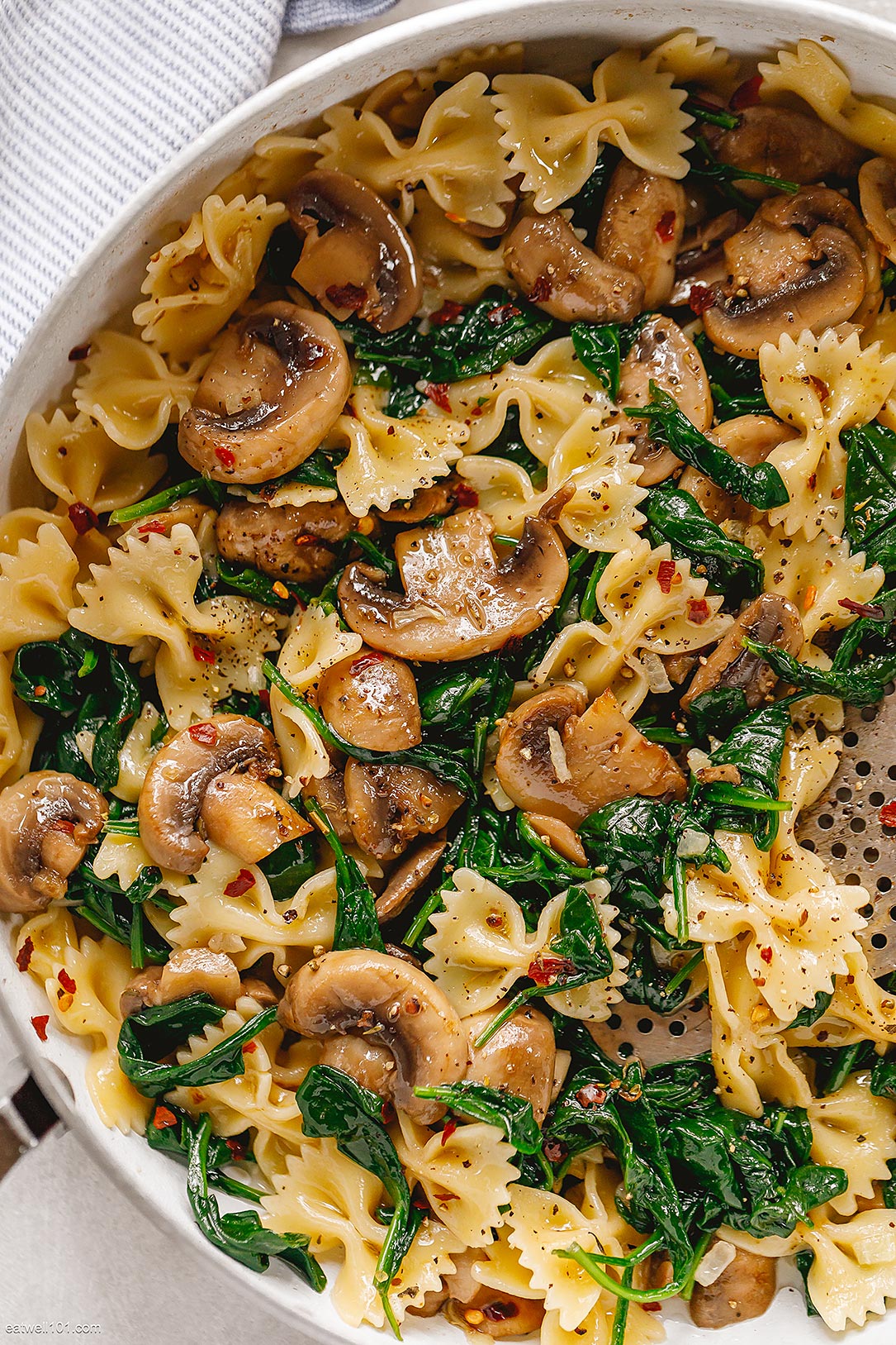 Mushroom and Spinach Pesto Pasta with Toasted Pine Nuts