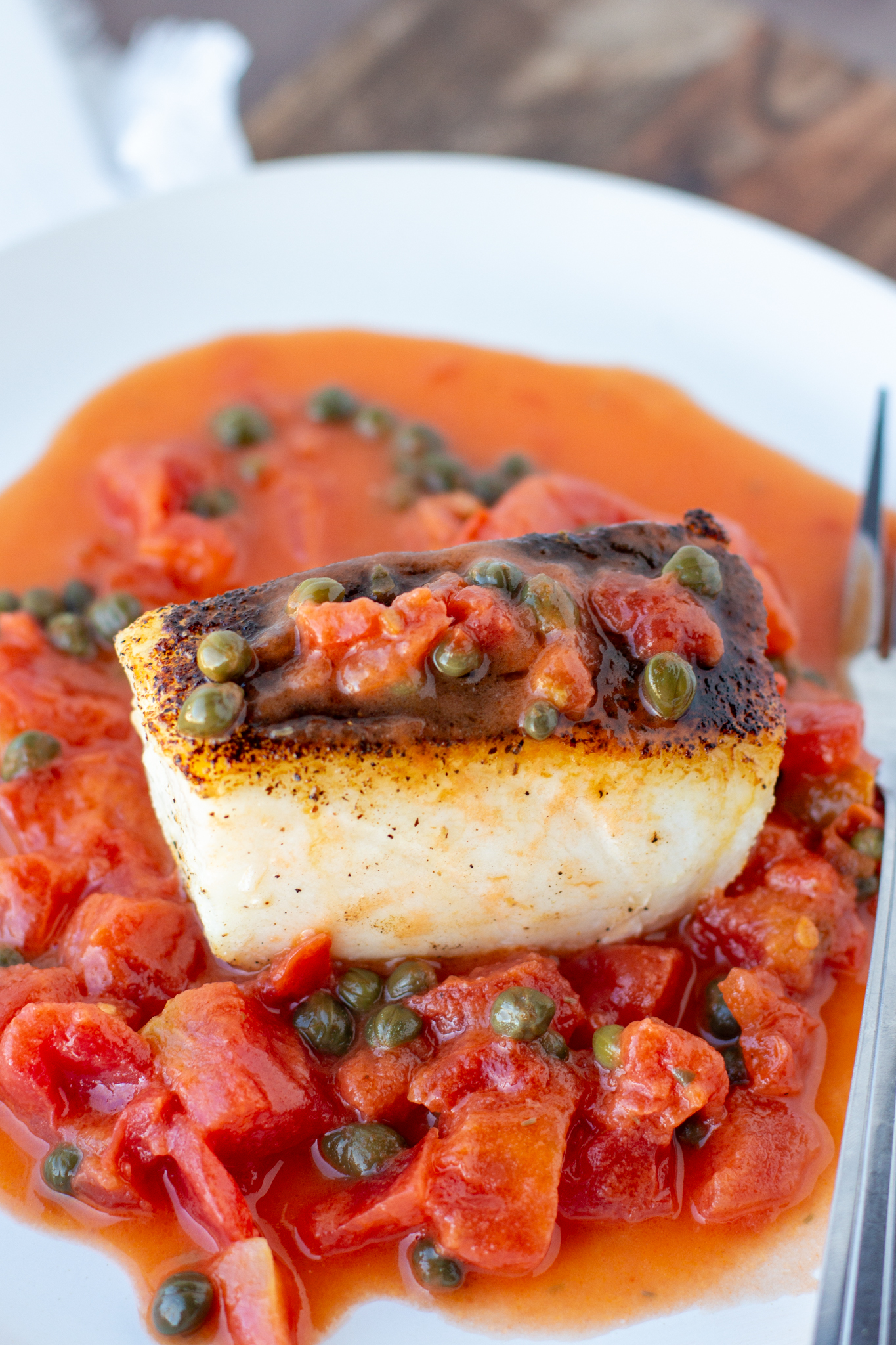 Pan-Seared Sea Bass with Tomato-Caper Salsa and Herb Oil