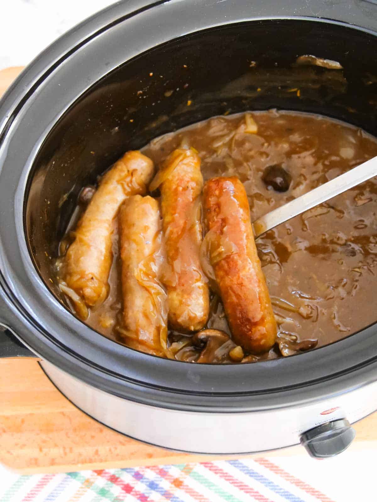 Slow-Cooked Curried Sausages in Tomato Onion Gravy