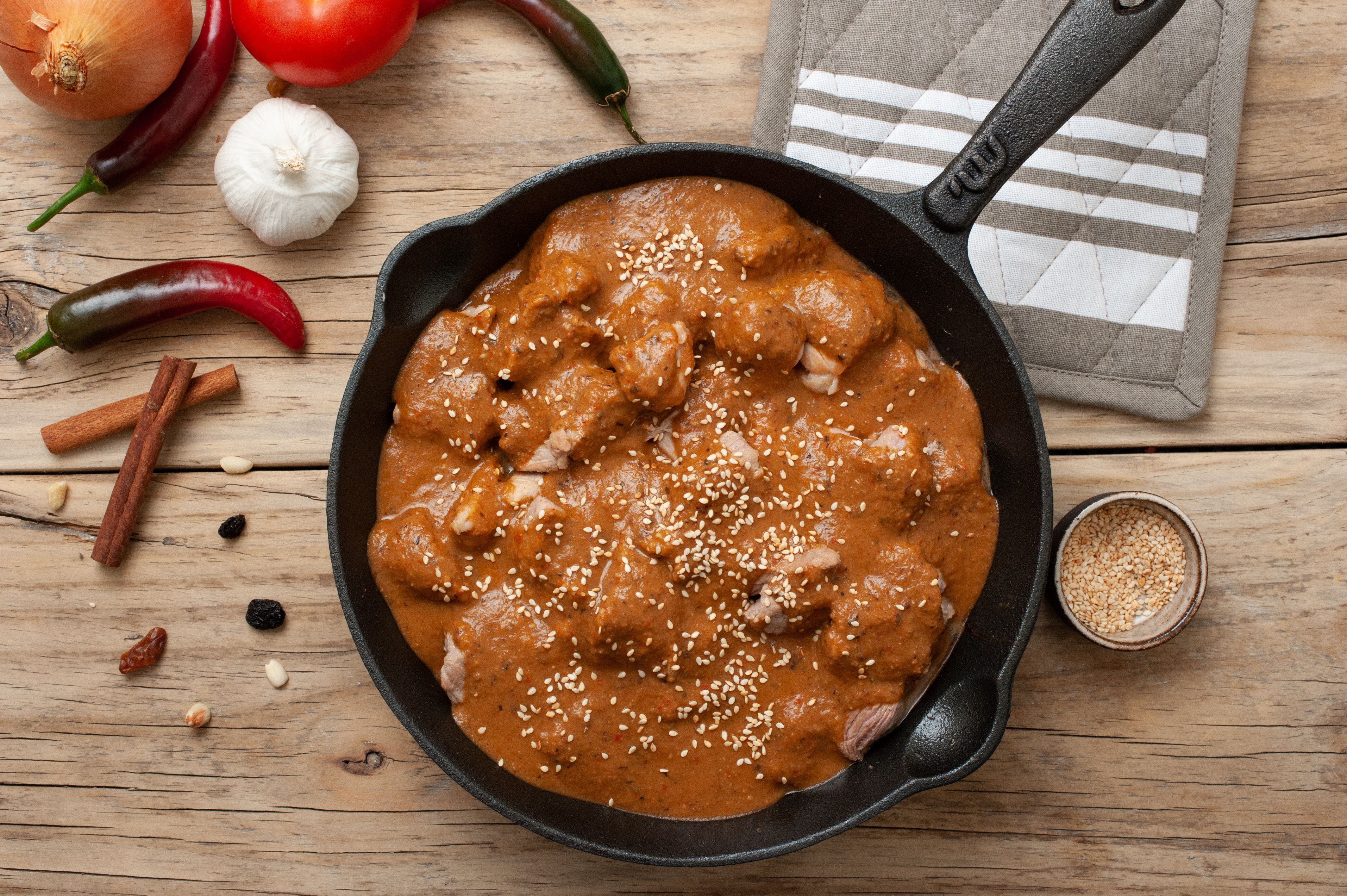 Stewed Pork in Red Oaxacan Mole with Toasted Sesame