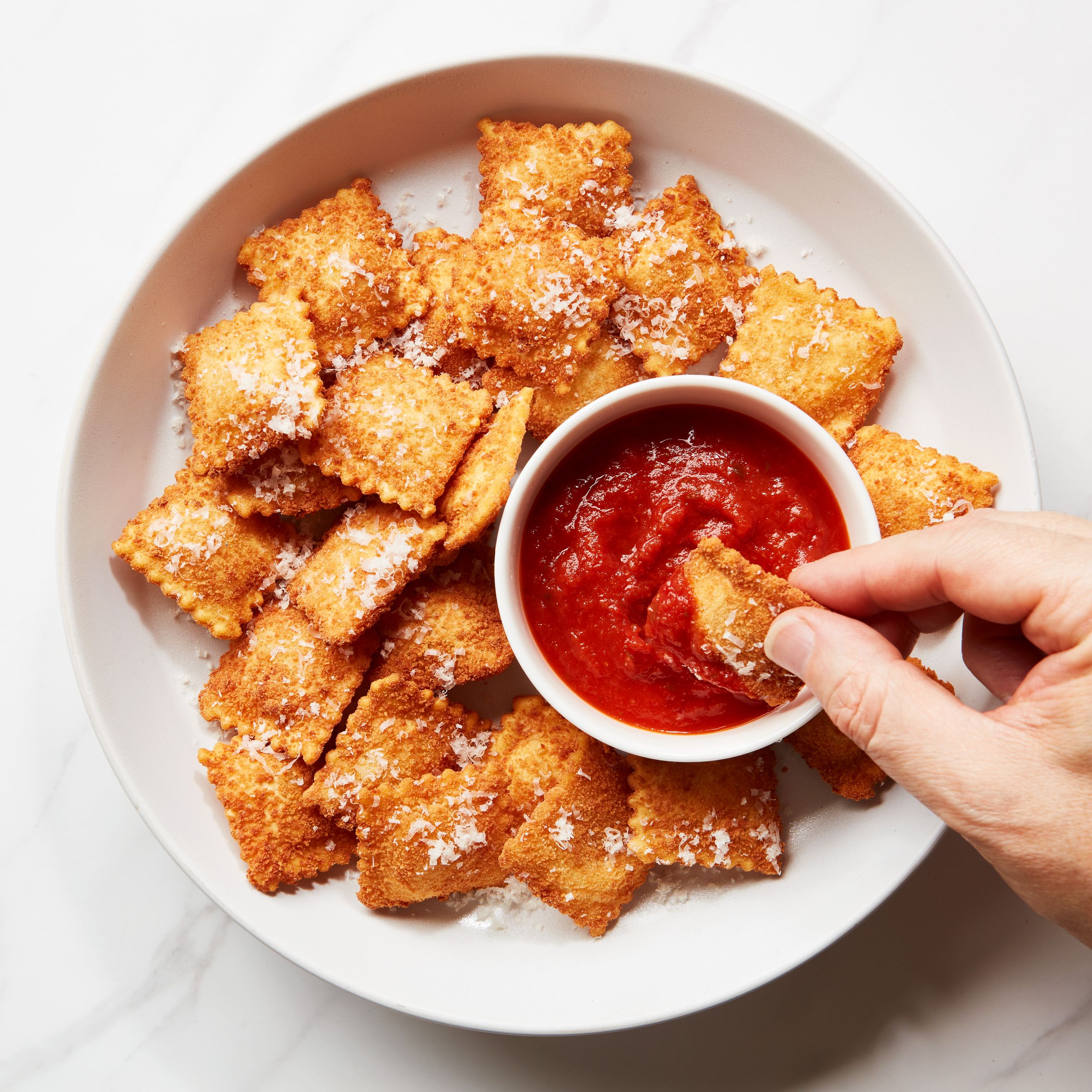 Pan-Fried Toasted Ravioli with Spicy Marinara Dipping Sauce