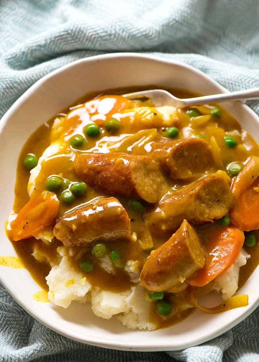 Slow-Cooked Curried Sausages with Creamy Mashed Potatoes