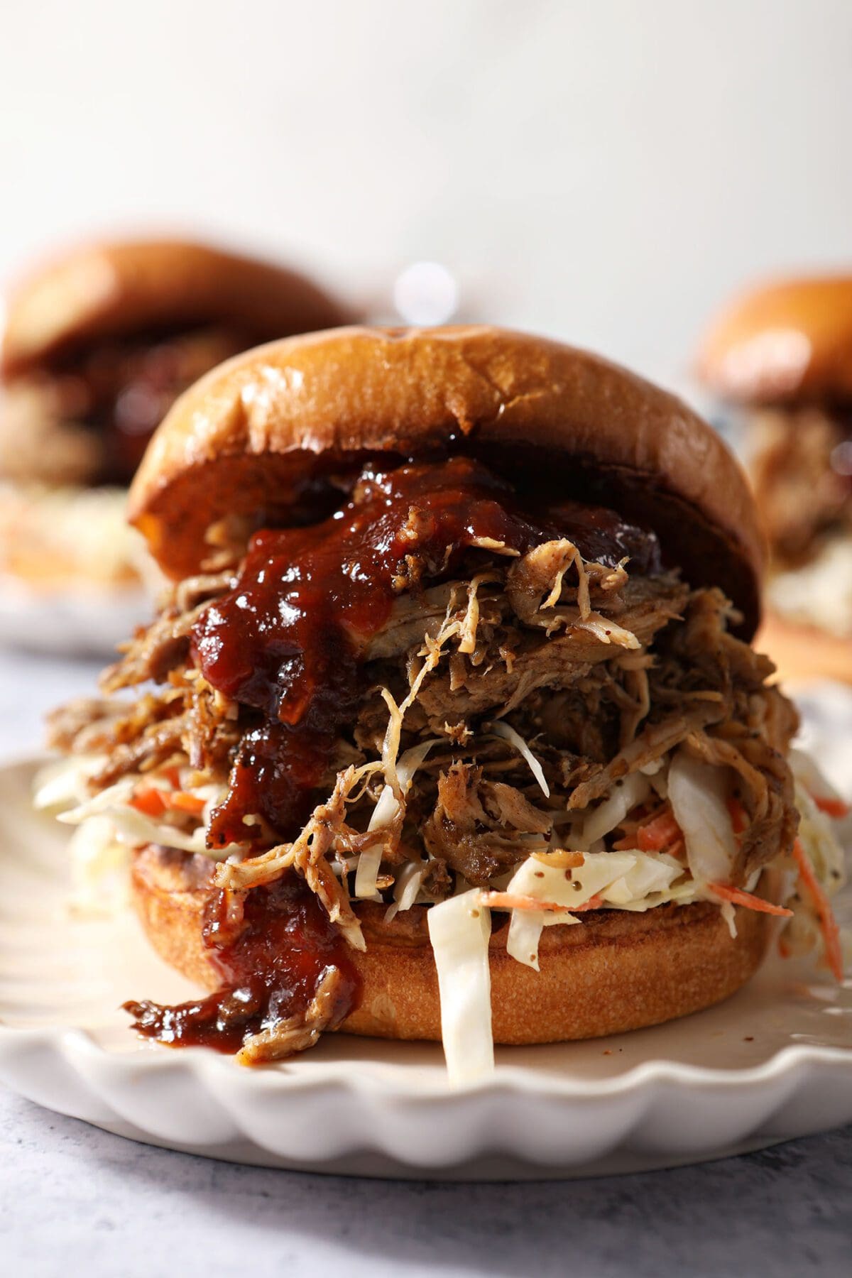 Smoked Memphis-Style Pulled Pork Sandwiches with Tangy Coleslaw