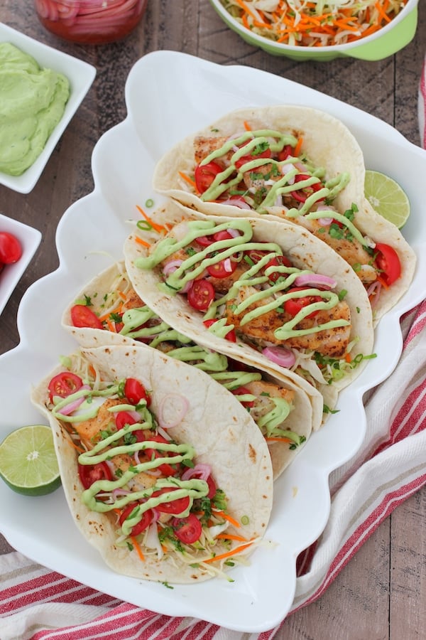 Pan-Seared Fish Tacos with Avocado Crema and Pickled Red Onions