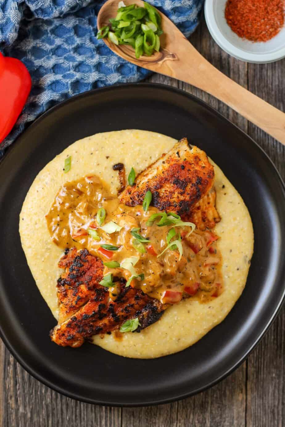 Pan-Fried Catfish with Cajun-Spiced Grits and Sautéed Greens