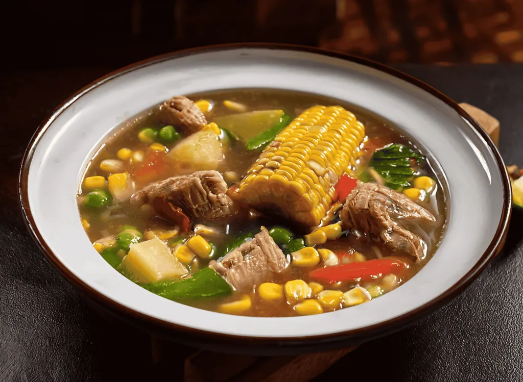 Slow-Simmered Salvadoran Chicken Soup with Corn and Vegetables