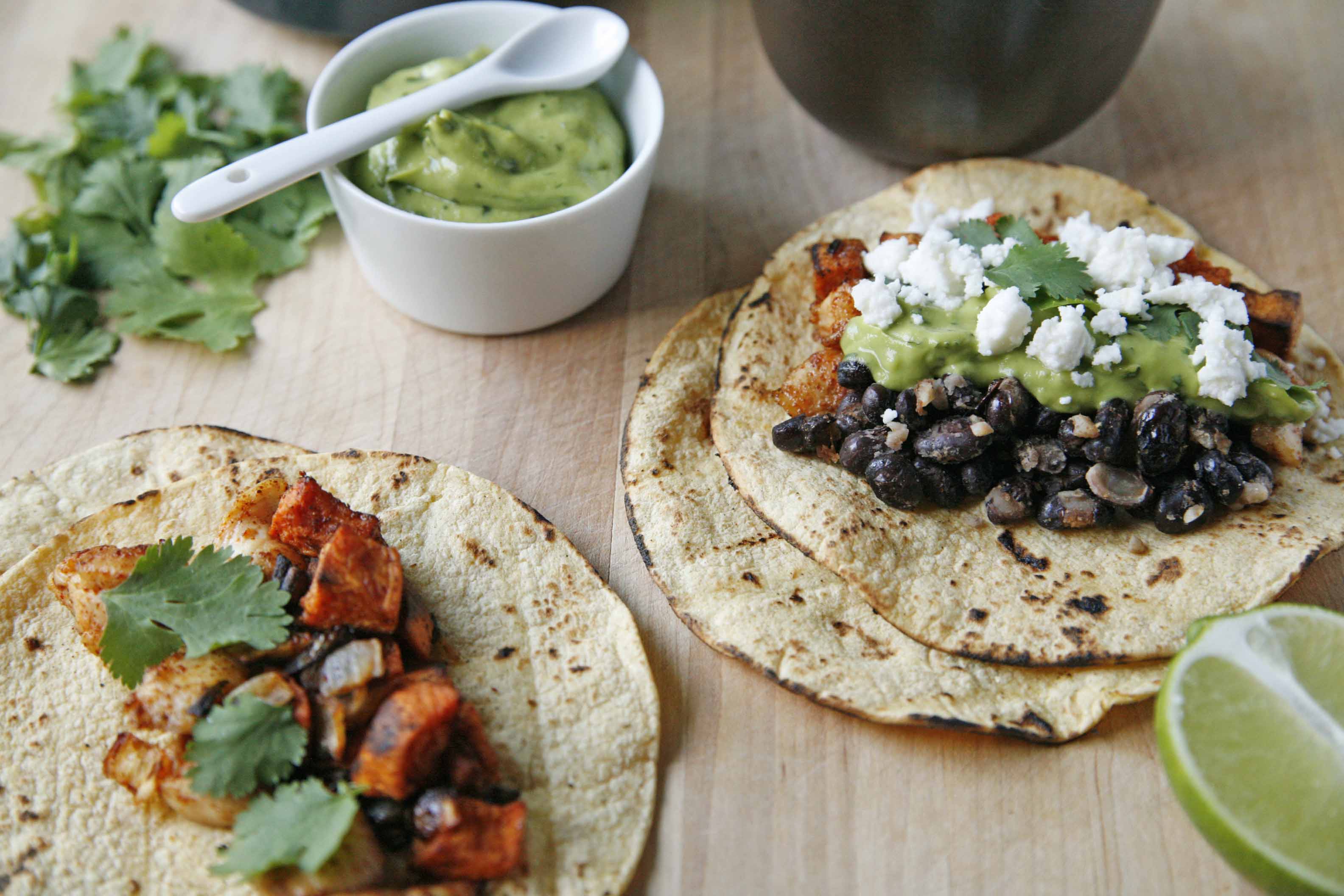 Creamy Black Bean & Sweet Potato Tacos with Avocado Crema