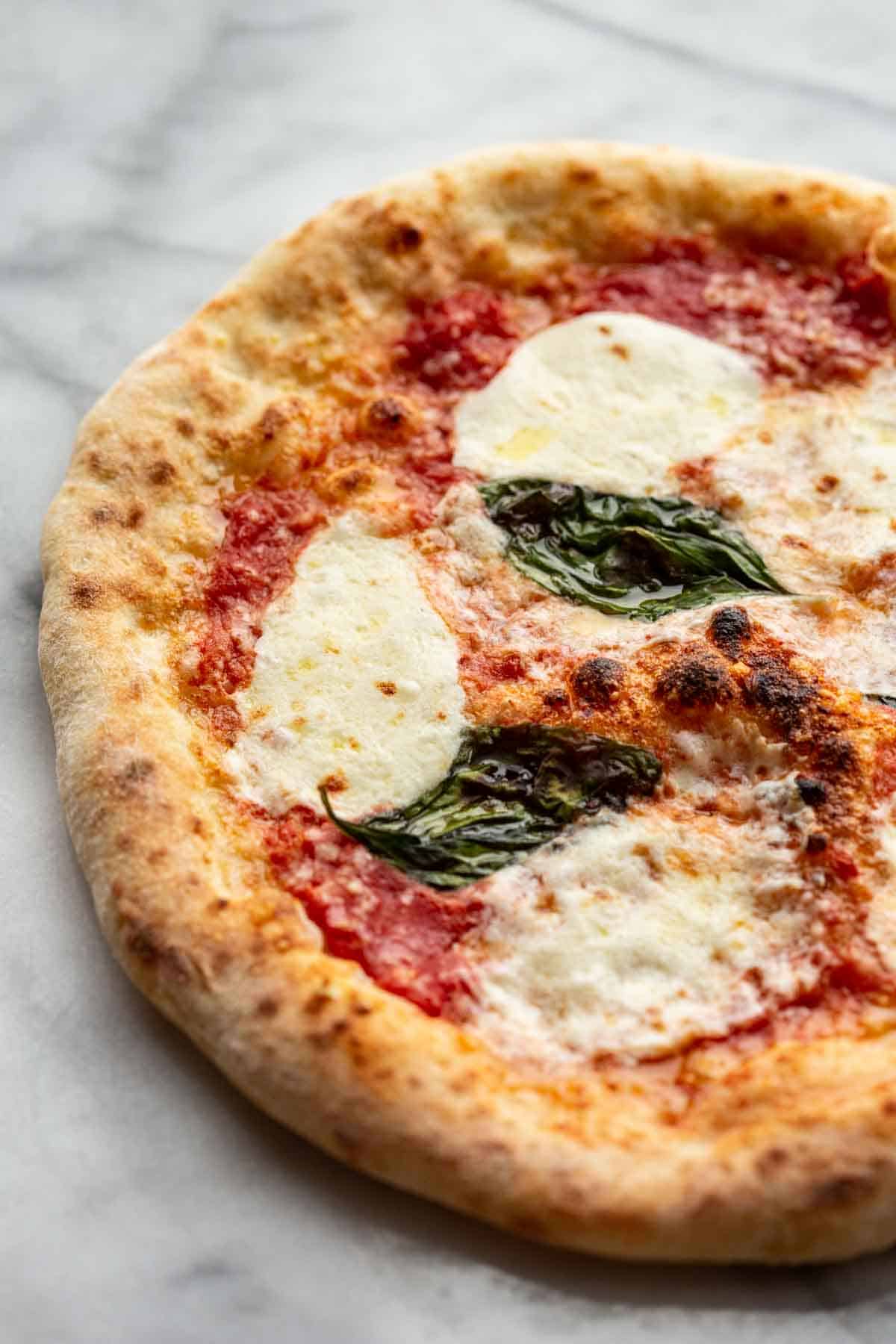 Charred Neapolitan-Style Pizza with San Marzano Tomato and Fresh Mozzarella