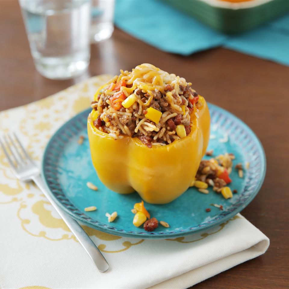 Spiced Boudin-Stuffed Bell Peppers with Creole Rice