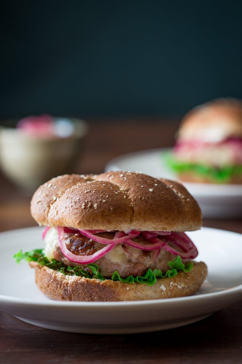 Pan-Seared Burger with Tangy Pickled Onion and Mixed Greens Salad