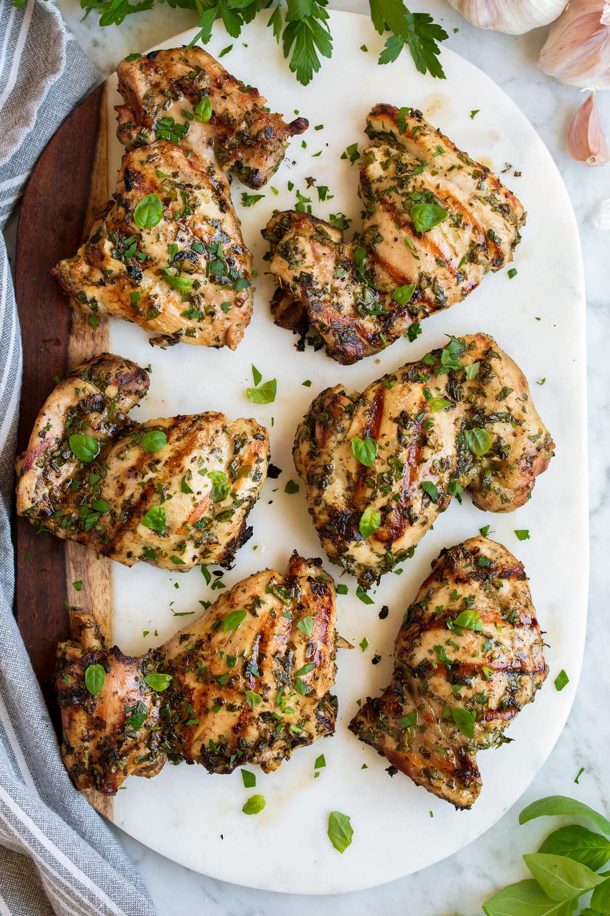 Grilled Citrus-Herb Chicken Thighs with Garlic Yogurt Sauce