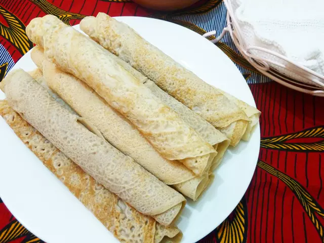 Steamed Injera Rolls with Spiced Collard Greens