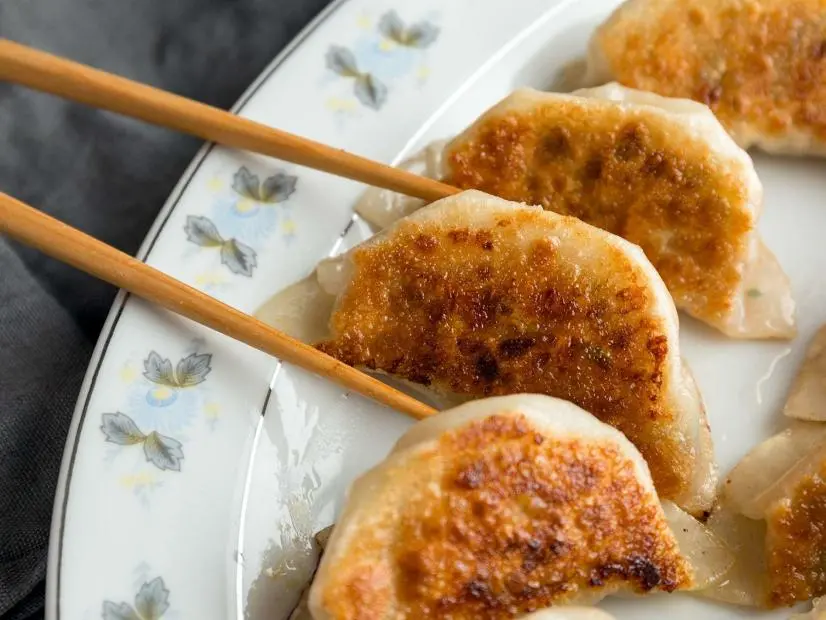 Pan-Fried Pork Dumplings with Scallion-Soy Dipping Sauce