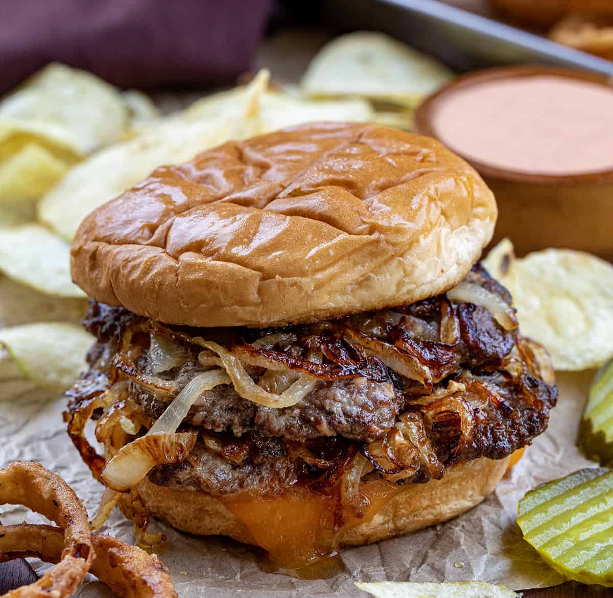 Grilled Cap City Diner Burger with Smoked Cheddar and Pickled Red Onion