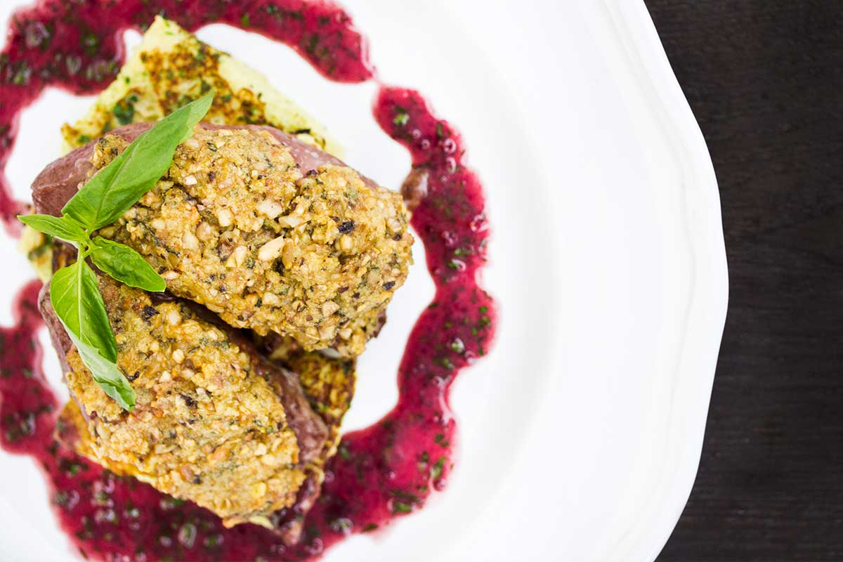 Macadamia-Crusted Kangaroo Medallions with Wattleseed Sauce