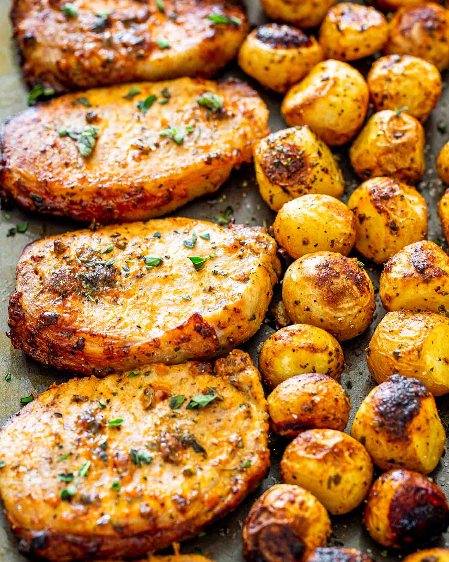 Baked Herb-Crusted Pork Chops with Garlic Butter