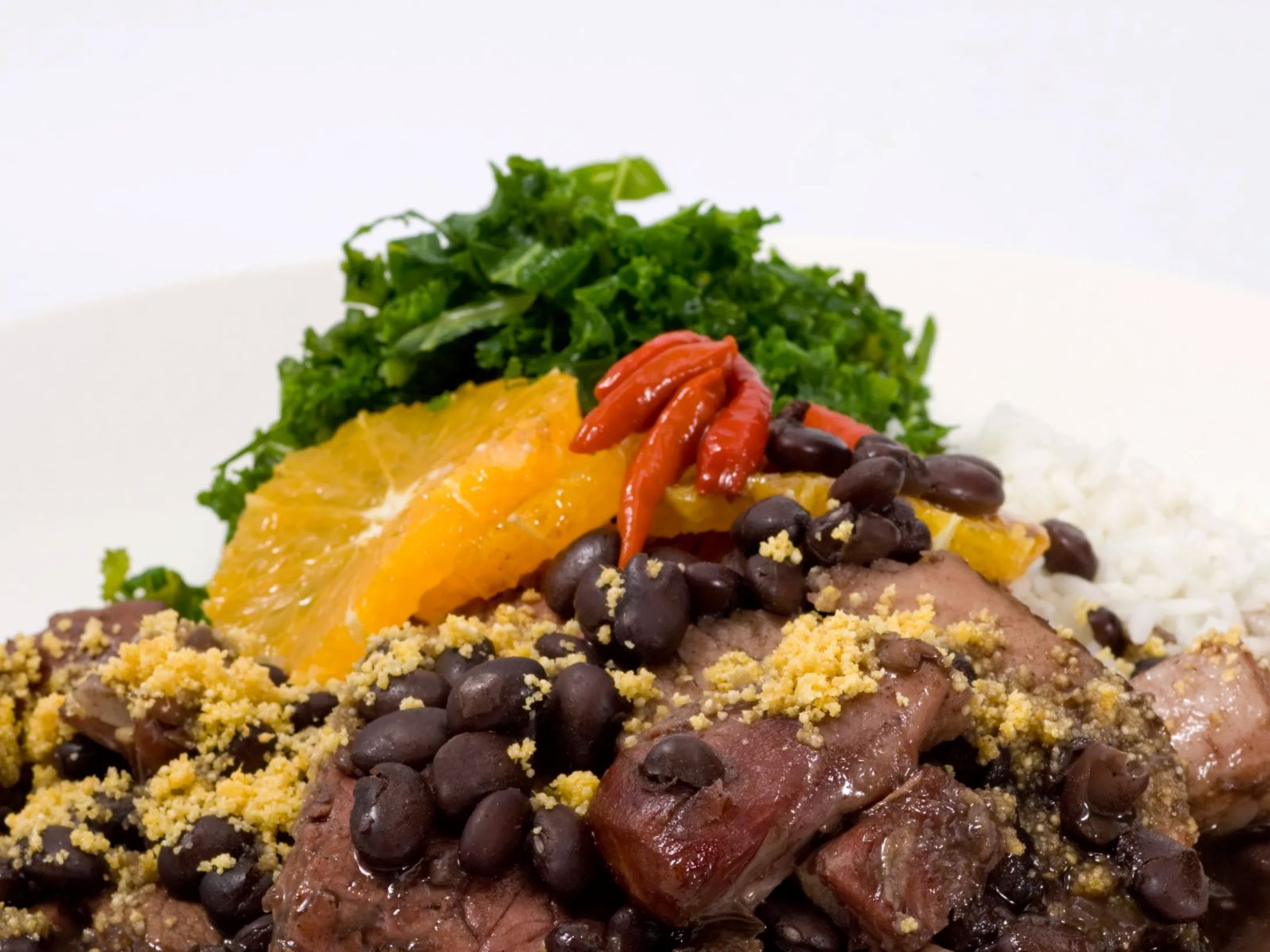 Slow-Cooked Beef with Brazilian Black Beans and Farofa