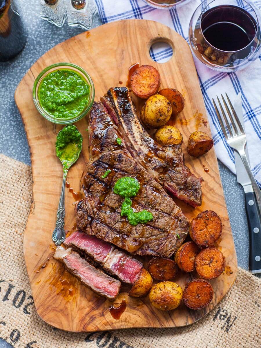 Pan-Seared Ribeye with Charred Garlic Butter and Herb Salad