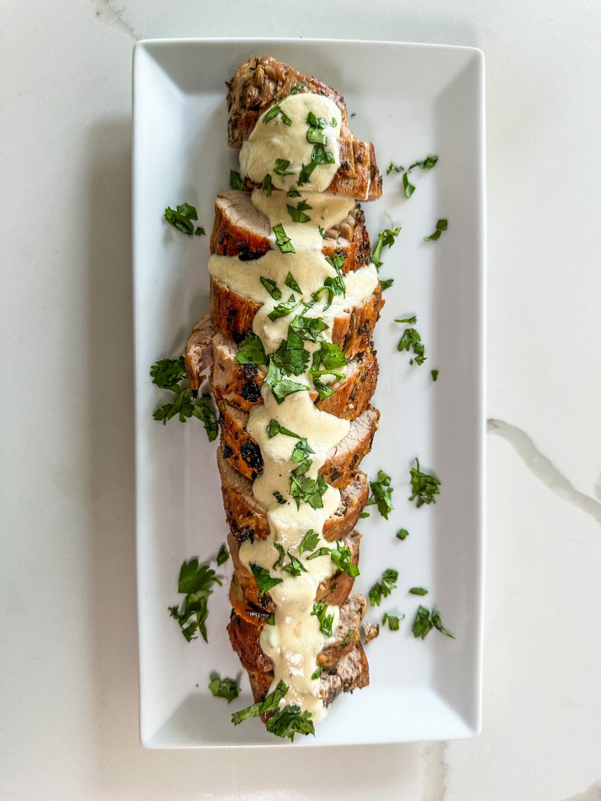 Herbed Pan-Seared Pork Tenderloin with Garlic Jus