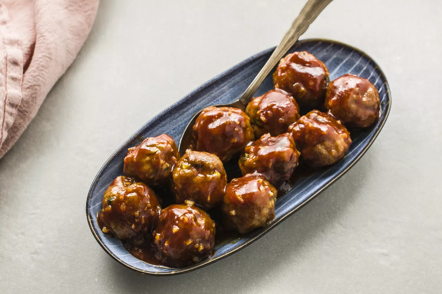 Cheddar-Stuffed Pork Meatballs with Garlic Butter Sauce