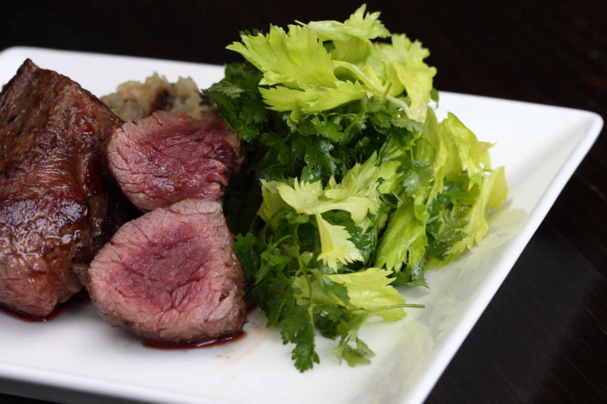 Slow-Roasted Kangaroo Medallions with Pepperberry Jus