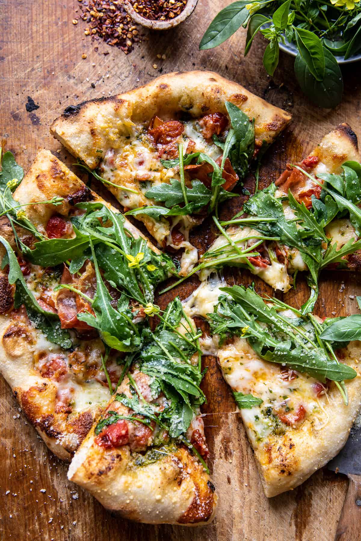 Wood-Fired Thin Crust Pizza with Roasted Garlic and Arugula