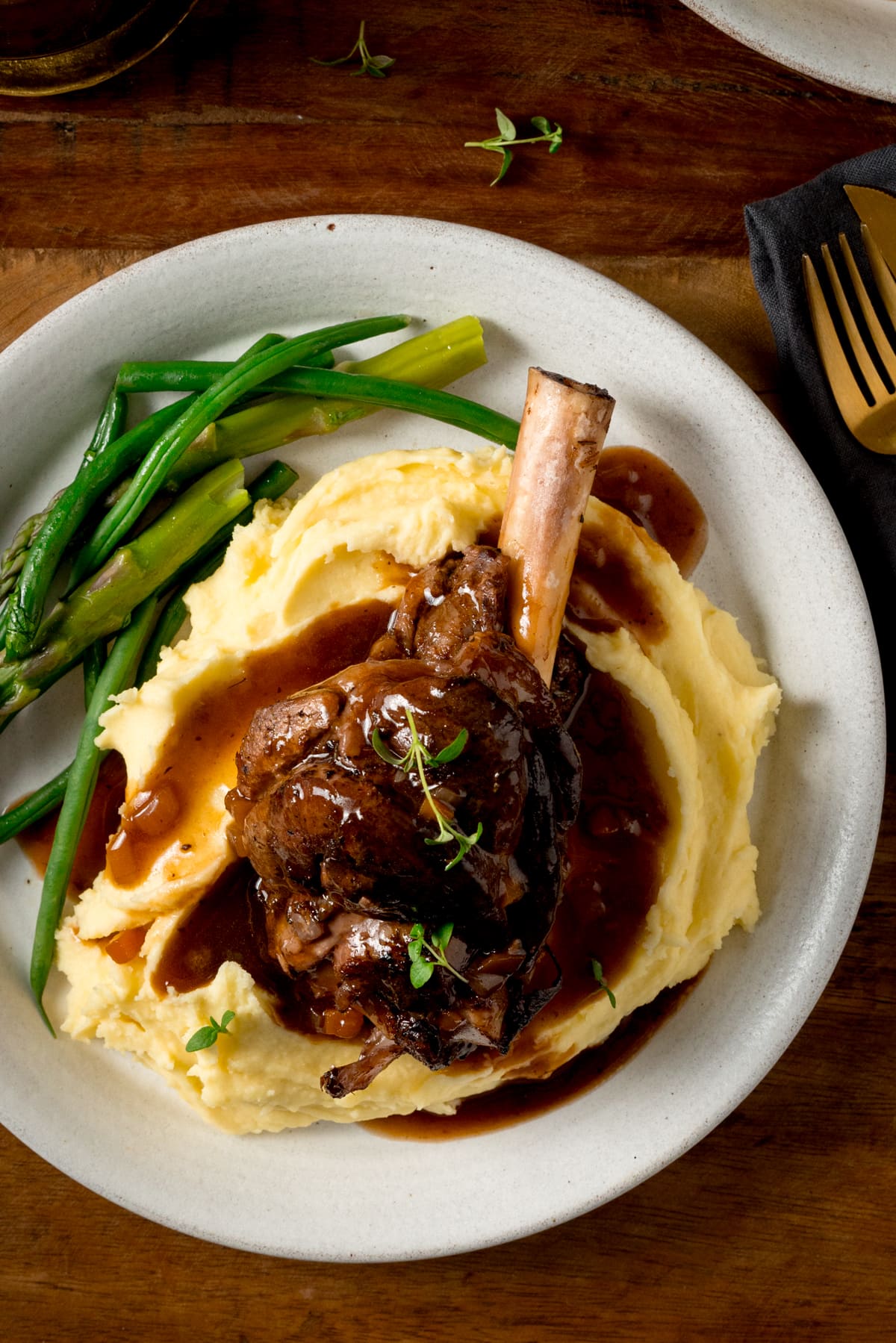 Slow-Cooked Lamb Shanks with Native Mint and Quandong Sauce