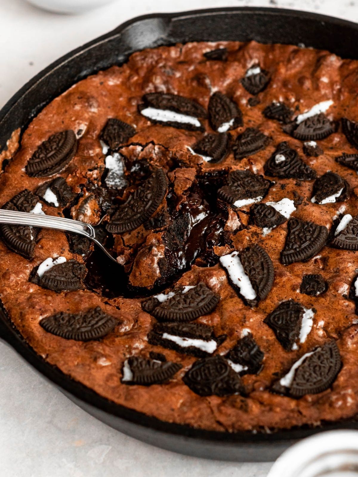 Baked Oreo Brownie Skillet with Chocolate Ganache
