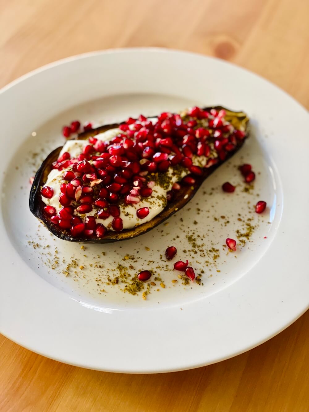 Za'atar Roasted Eggplant with Pomegranate and Pine Nuts