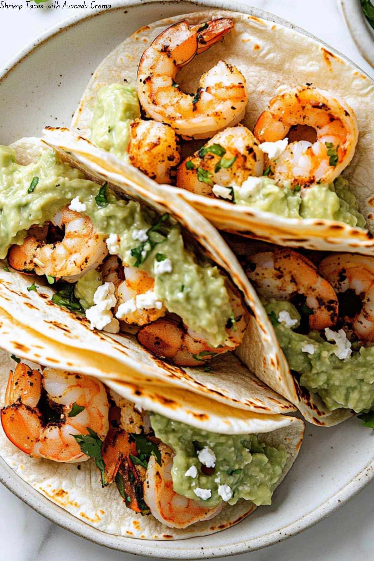 Garlic-Lime Shrimp Tacos with Avocado Crema