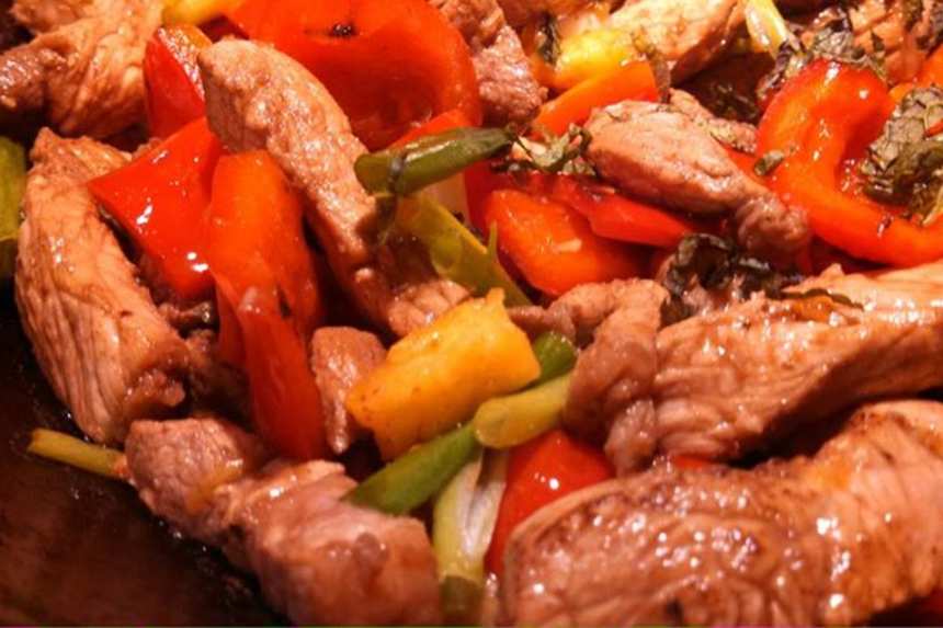 Tamarind-Spiced Pork Stir Fry with Bell Peppers and Basil