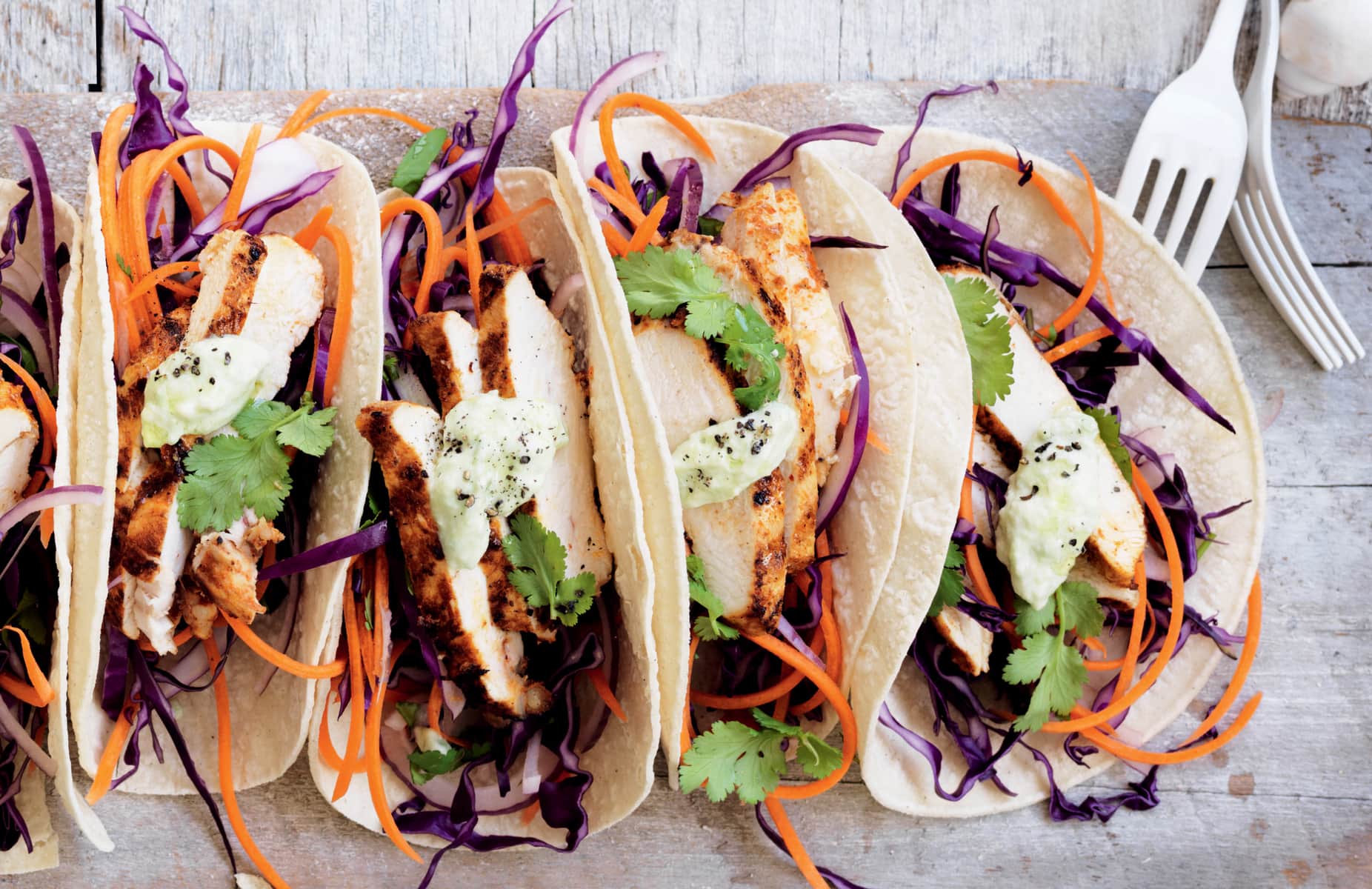 Spicy Tex-Mex Chicken Tacos with Avocado Crema