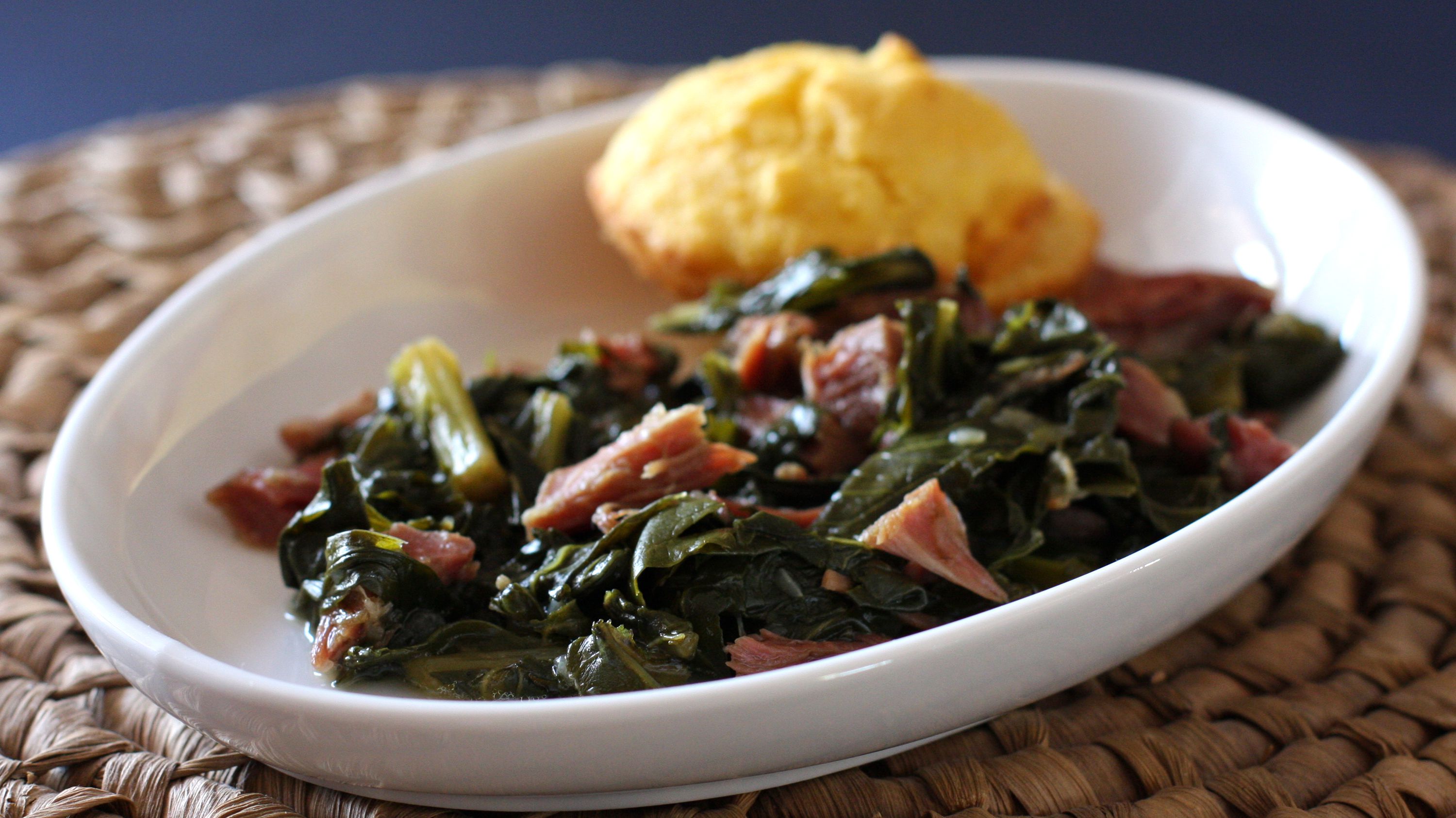 Slow-Cooked Collard Greens with Smoked Ham Hock and Onion