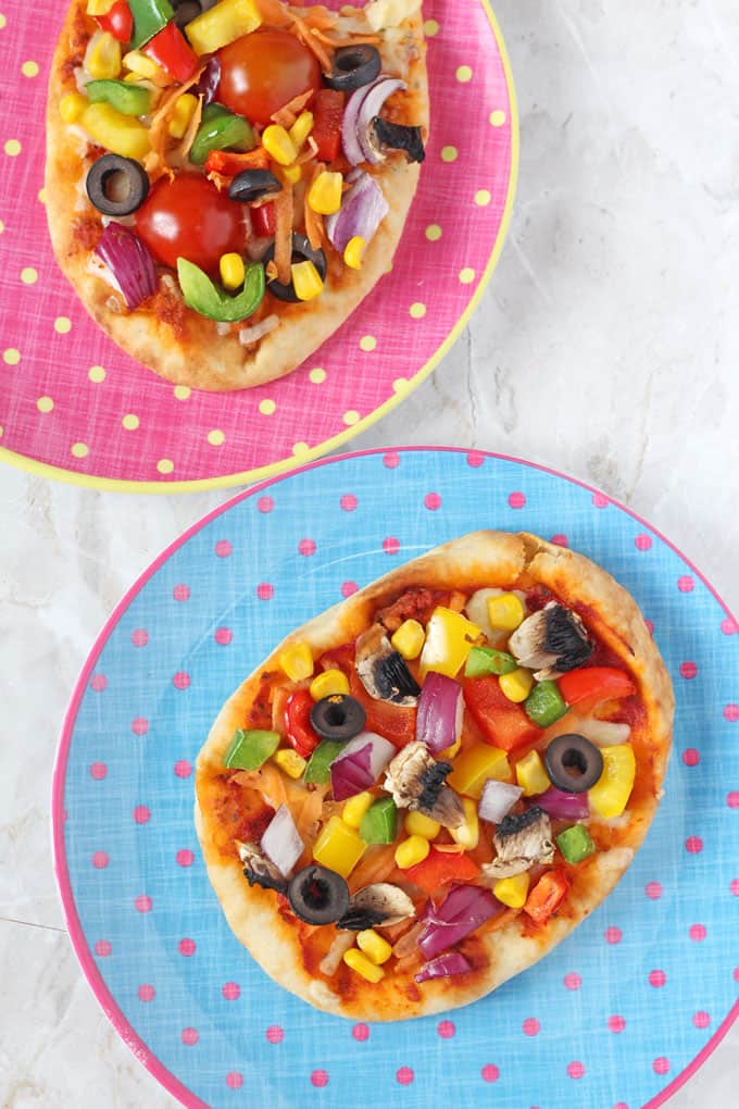 Kid-Friendly Mini Pita Pizzas with Colorful Veggie Toppings