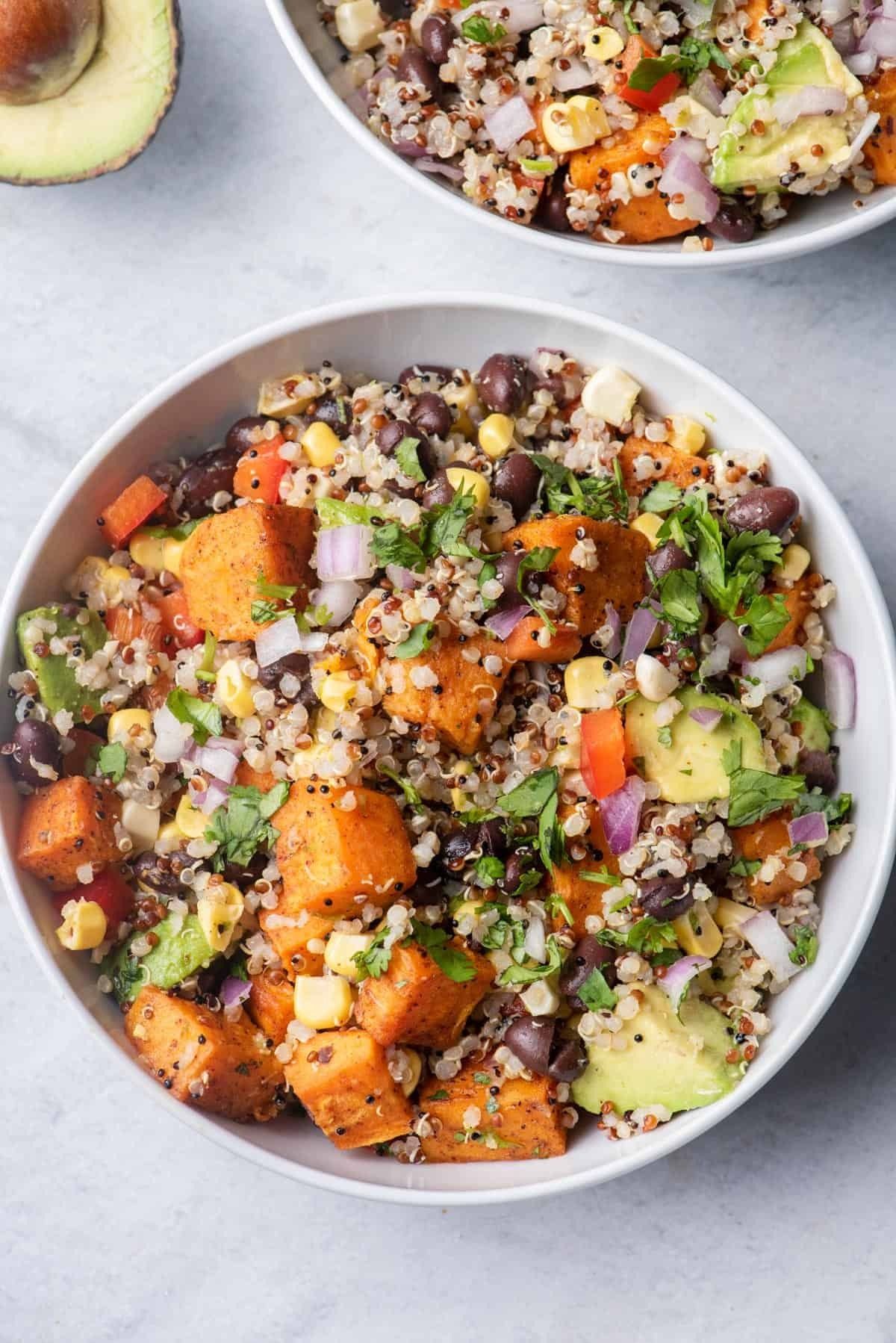 Veggie-Packed Quinoa Salad with Roasted Sweet Potatoes and Tahini Dressing