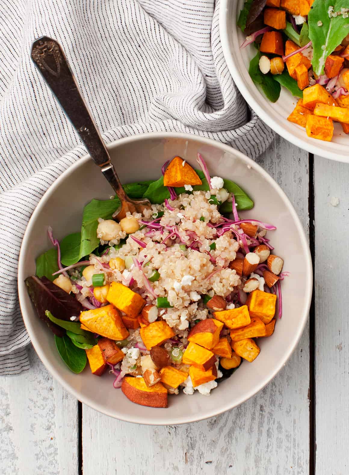 Veggie-Packed Quinoa Salad with Roasted Sweet Potatoes and Tahini Dressing