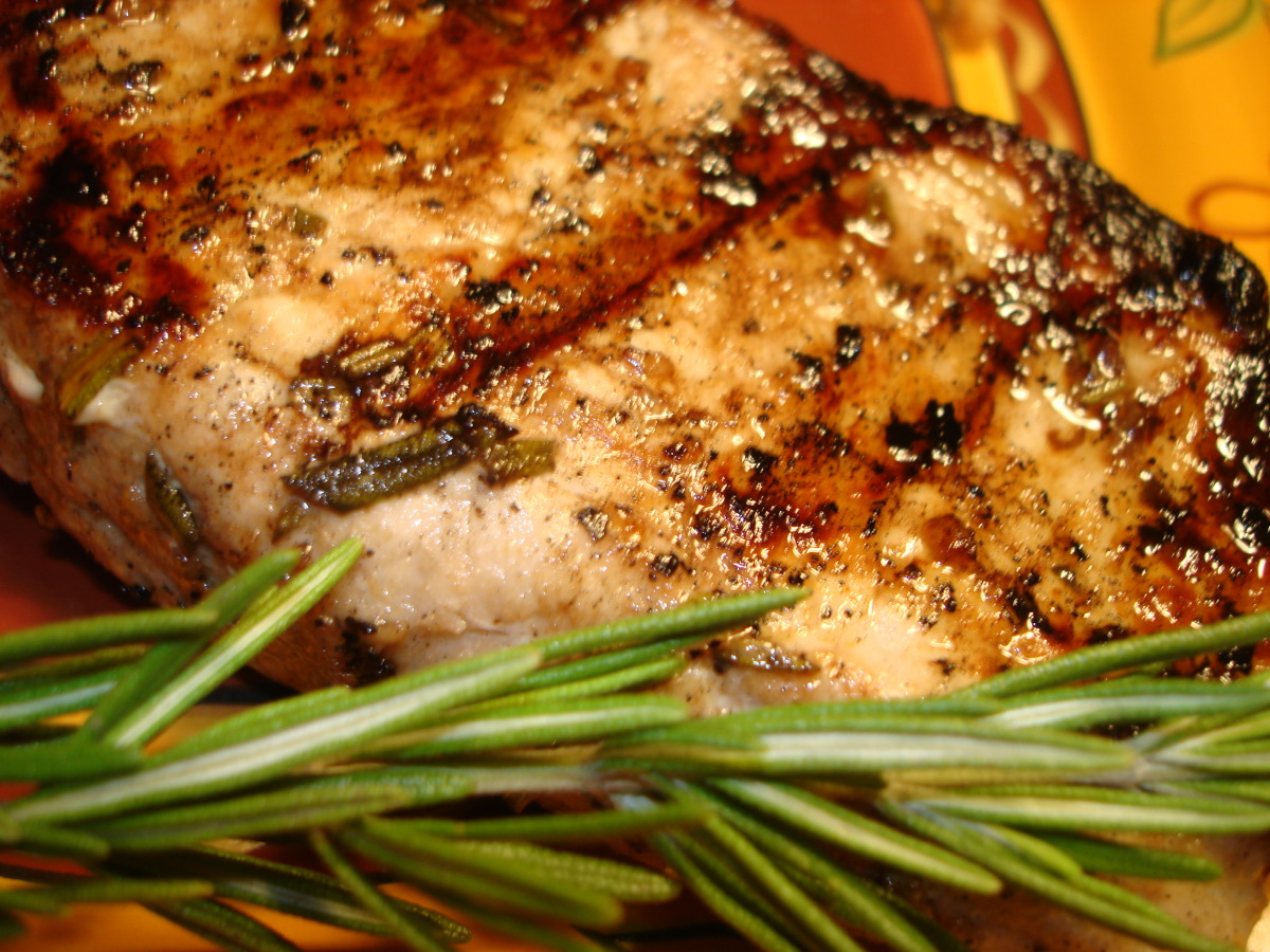 Grilled Lemon-Rosemary Pork Chops with Garlic Butter