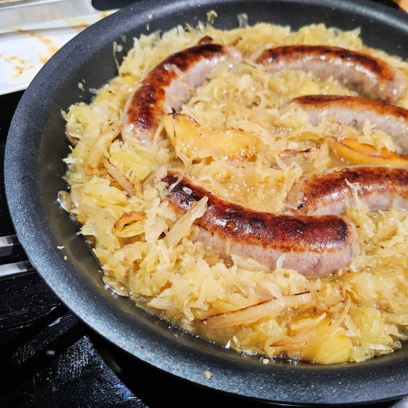 Pan-Roasted Bratwurst with Caramelized Onions and Sauerkraut