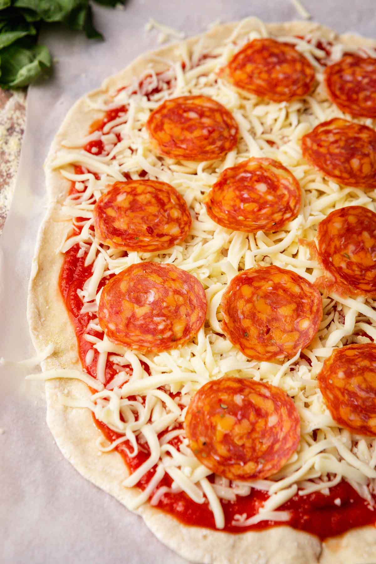Thin-Crust Pepperoni Pizza with Mozzarella and Tomato Sauce